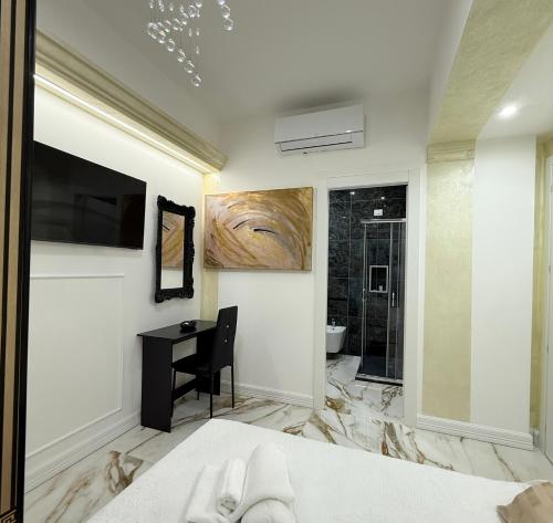 Cama o camas de una habitación en Suite Rooms Empire