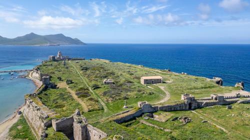 an aerial view of an island in the ocean at Mythos Suites-Apollo apartment in Methoni