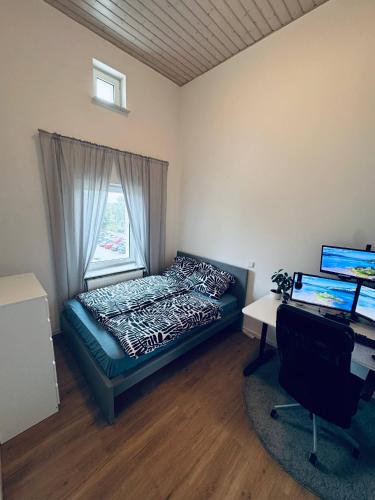 Ένα ή περισσότερα κρεβάτια σε δωμάτιο στο Stylish 3-room apartment, centrally located