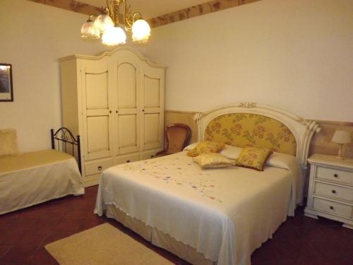 Postel nebo postele na pokoji v ubytování B&b La Balaustra
