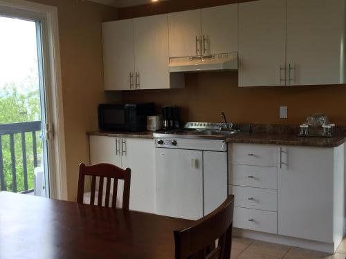 Dapur atau dapur kecil di Hôtel Maison Blanche
