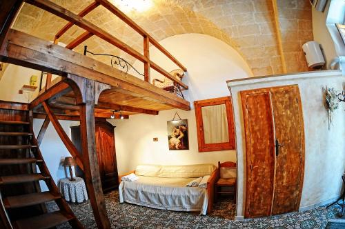 Postel nebo postele na pokoji v ubytování casa vacanze Filomena