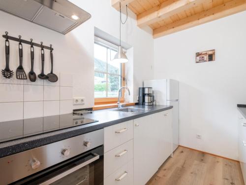 Una cocina o cocineta en Wolfgangchalet B