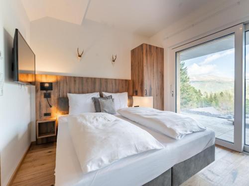 Ένα ή περισσότερα κρεβάτια σε δωμάτιο στο Ibex panorama Lodge