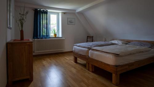 Postel nebo postele na pokoji v ubytování Ferienwohnung Alte Zainschmiede