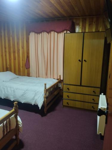 Cama o camas de una habitación en Hospedaje Maria