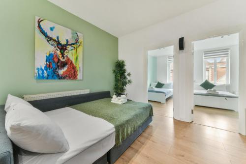 Una cama o camas en una habitación de Amazing 2 Bedrooms Flat In Dalston