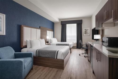 Voodi või voodid majutusasutuse Best Western Plus Gateway to the Falls toas