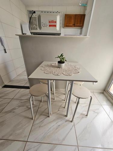 Dapur atau dapur kecil di Apartamento Aconchegante em Botucatu