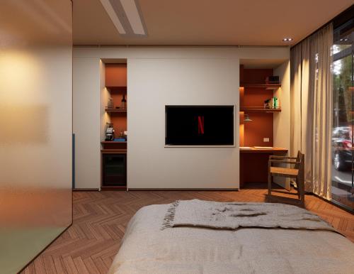 Cama o camas de una habitación en The Cut Hotel