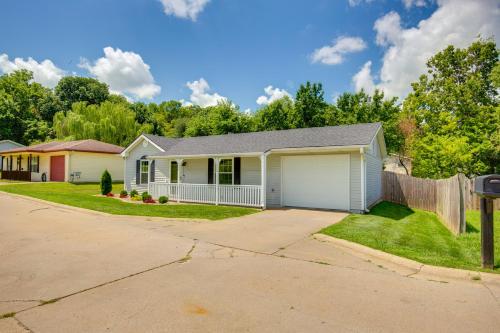a house with a fence in a yard at about 1 Mi to Shopping and Dining Quiet St Joseph Home in Saint Joseph