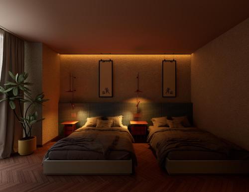 Cama o camas de una habitación en The Cut Hotel