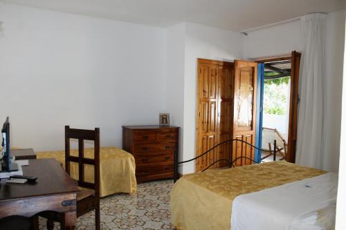 Postel nebo postele na pokoji v ubytování Hotel Tesoriero