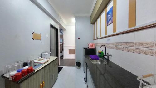 Zona de estar de 13pax GLORY EXECUTIVE SUITE 3R3B, DOORSTEP BEACH, POOL, BBQ, Wifi, 50"TV