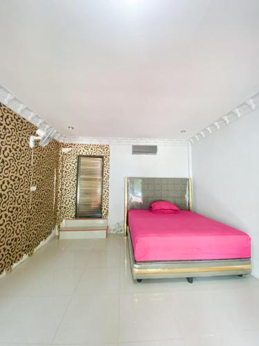 Ένα ή περισσότερα κρεβάτια σε δωμάτιο στο Dang-Dang Na Bungalows