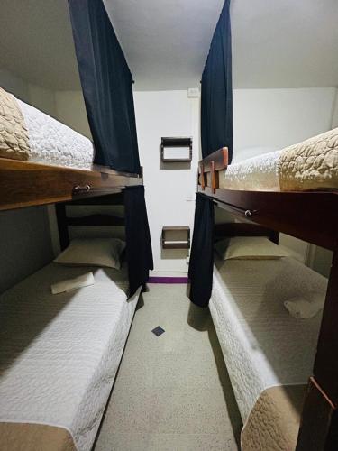 a group of bunk beds in a room at Casa Almanik Hostel in Medellín