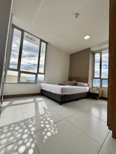 Ένα ή περισσότερα κρεβάτια σε δωμάτιο στο Edificio Plaza U Wellness