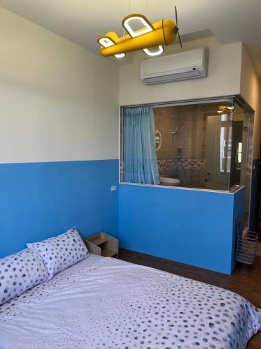 Ein Bett oder Betten in einem Zimmer der Unterkunft Green Only Homestay