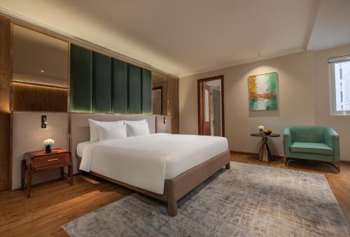 Ένα ή περισσότερα κρεβάτια σε δωμάτιο στο Hanoi Splendid Premium Hotel