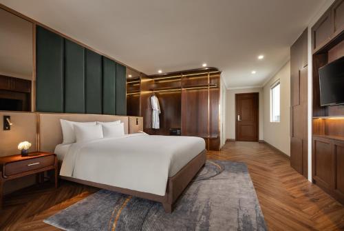 Ένα ή περισσότερα κρεβάτια σε δωμάτιο στο Hanoi Splendid Premium Hotel