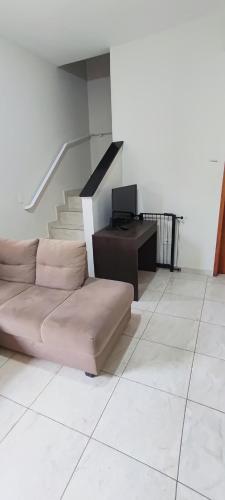 Χώρος καθιστικού στο Sobrado em condomínio tranquilo em Mongagua