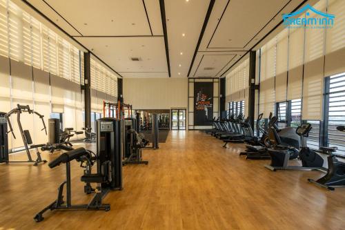 a gym with lots of treadmills and cardio machines at Paxtonz Empire City Damansara Petaling Jaya by Dream Inn in Petaling Jaya