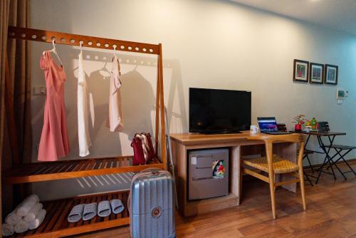 Μια τηλεόραση ή/και κέντρο ψυχαγωγίας στο Picturesque Hanoi Homestay