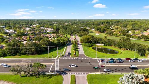 an aerial view of a parking lot with cars at Modern Condo on the lake Oldsmar FL in Oldsmar