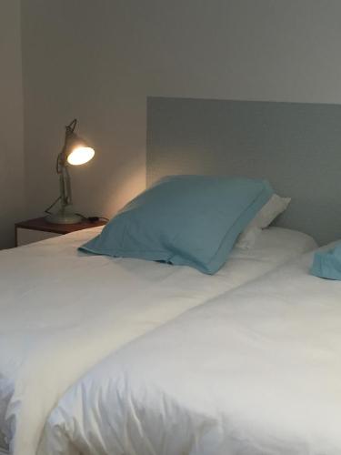 Postel nebo postele na pokoji v ubytování B&B Lily et Paul