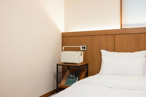 Postel nebo postele na pokoji v ubytování Glen Stay Dongducheon