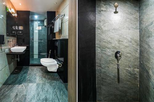 Ένα μπάνιο στο Super Townhouse Jhalawar Road Gumanpura Formerly Rockland