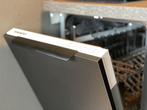 a close up of a dishwasher in a kitchen at M14 - Innenstadt Studio in Stuttgart Zentrum in Stuttgart