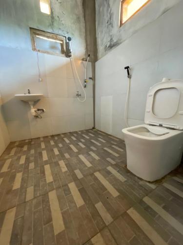 Ένα μπάνιο στο Purangjompa Homestay