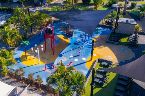 an aerial view of a water park with a slide at NRMA Treasure Island Holiday Resort in Gold Coast