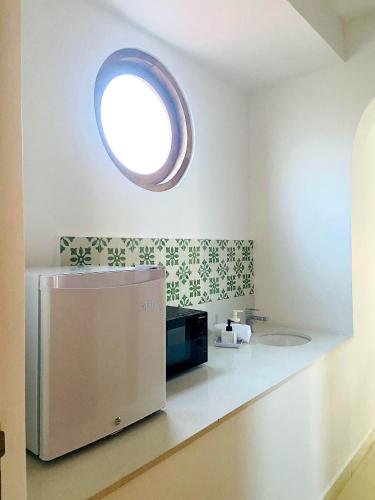 Η κουζίνα ή μικρή κουζίνα στο Sulang Villa
