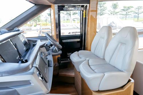 two white seats in the back of a vehicle at Saigon Luxury Private Yacht Prestige 590 - Managed by Vietyacht Club in Ho Chi Minh City