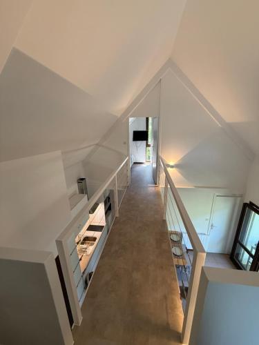 La petite maison في Saint-Martin-d'Uriage: منظر علوي لدرج في منزل