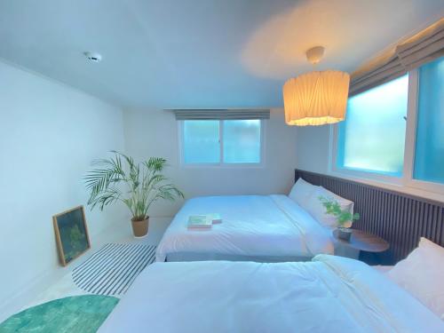 En eller flere senge i et værelse på Stay in EV