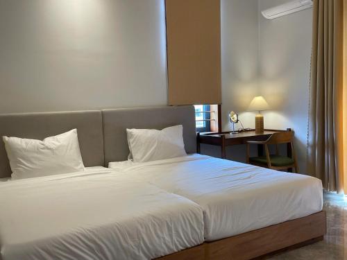 Katil atau katil-katil dalam bilik di Field Villa Hoàng Diệu