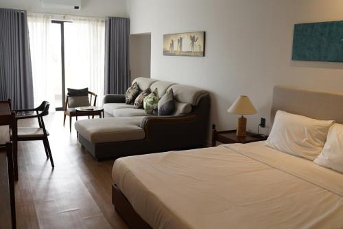 Katil atau katil-katil dalam bilik di Field Villa Hoàng Diệu