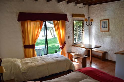Postel nebo postele na pokoji v ubytování Stellamar Apart Hotel