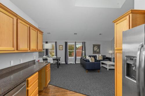 a kitchen and a living room with a couch at Blue Star Motel in Douglas