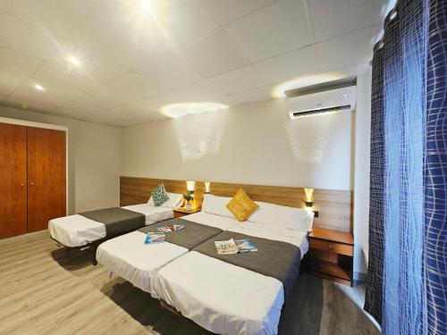 Hotel Mar i Solにあるベッド