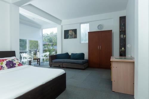 Ένα ή περισσότερα κρεβάτια σε δωμάτιο στο Kandy Luxe Villa