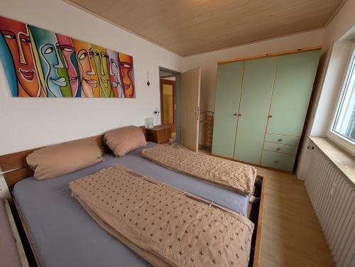 Katil atau katil-katil dalam bilik di Gemütliche Wohnung in Bodenseenähe