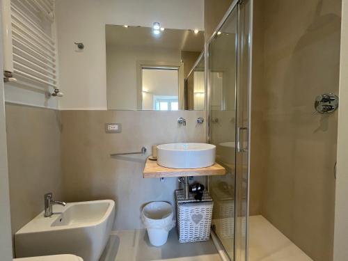 a bathroom with a sink and a shower at La Torretta dimora storica in Montesano Salentino