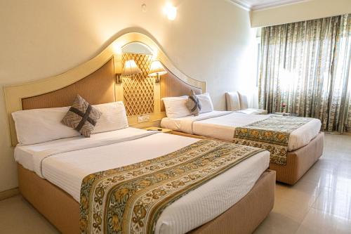 Ένα ή περισσότερα κρεβάτια σε δωμάτιο στο HOTEL BASERAa