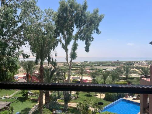a view of the ocean from the balcony of a resort at Lazib Inn Resort & Spa in Tunis