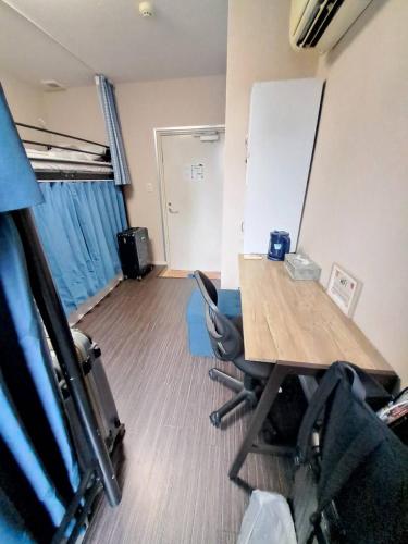 Ruang duduk di Fukuoka Tabiji Hostel & Guesthouse
