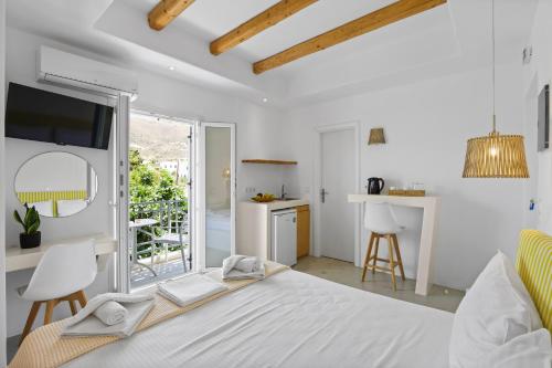 Letto o letti in una camera di Ammoudi